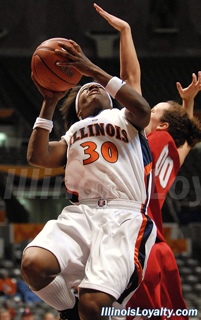 Rebecca Harris drives for two of her 14 points.