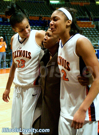 Jenna Smith (left), Coach Law and Lacey Simpson (right) leave the court after Illinois's upset of #19 Ohio State.