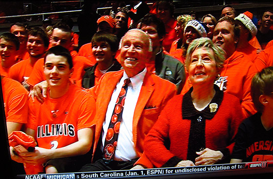 Lou Henson in the orange blazer