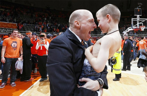 John Groce celebrating with his son