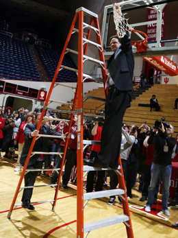 Tom Crean cuts down the net