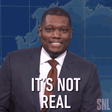 its-not-real-michael-che.gif