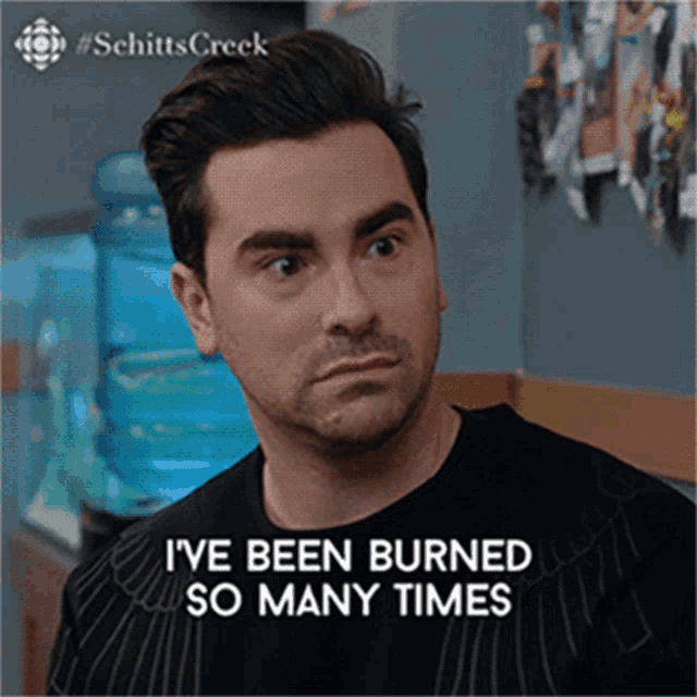 ive-been-burned-so-many-times-im-equivalent-of-the-inside-of-a-roasted-marshmallow-dan-levy.gif